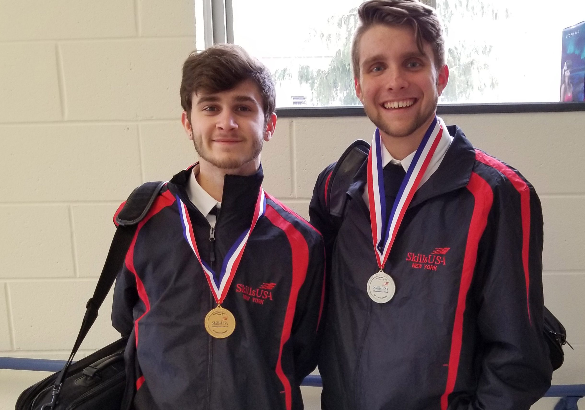 Both wearing medals, DiScioscia, left, and Ropeter, right.