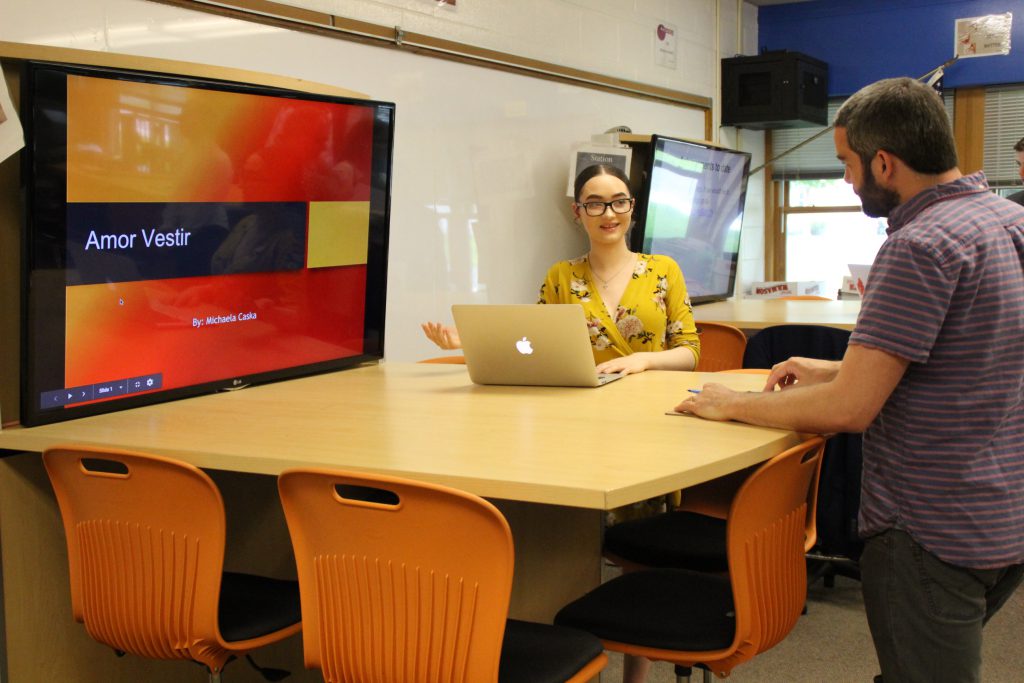 A student speaks to a business professional about her business concept