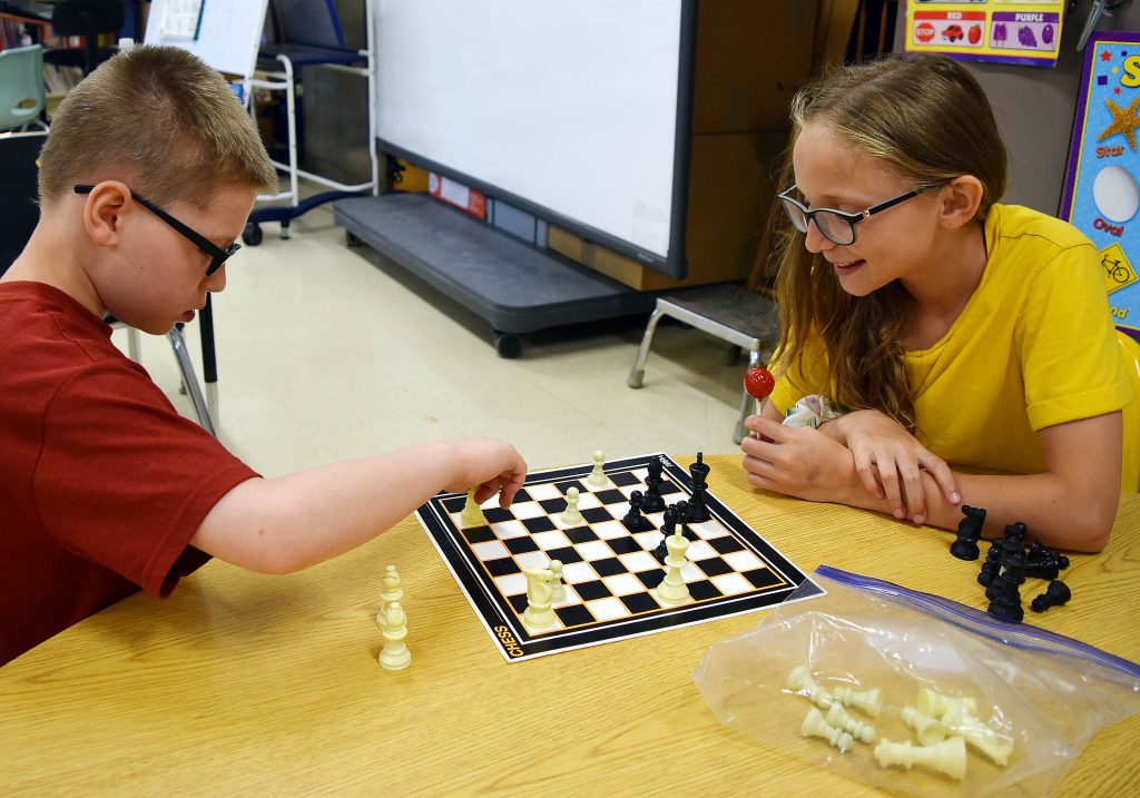 Two students play chess