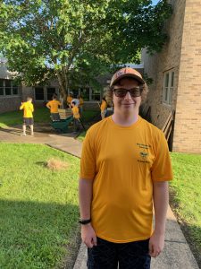 PTECH student Shain Krutz works with his troop members on his Eagle Scout project at Jansen Avenue School.