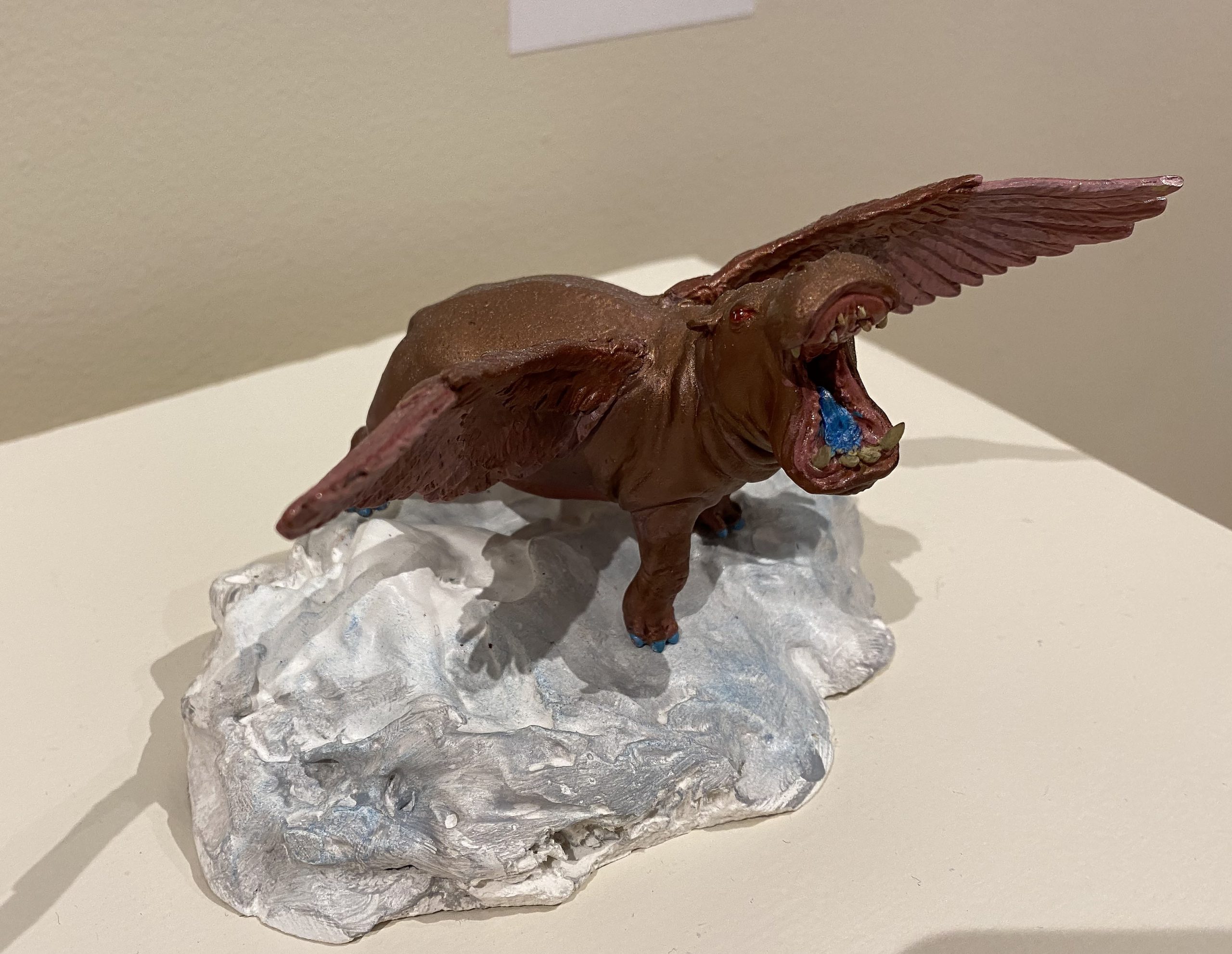A close up shot of Vicciarelli's artwork, a winged hippo