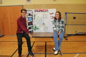 male and female student show off their civilizations expo project called Baltanism