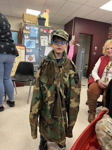 Student Wearing military veteran uniform