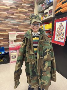 Student Wearing military veteran uniform