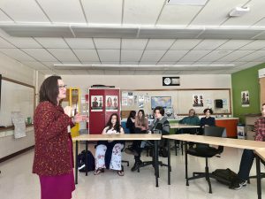 Kara Ulasewicz-Travis speaks to students at PTECH.