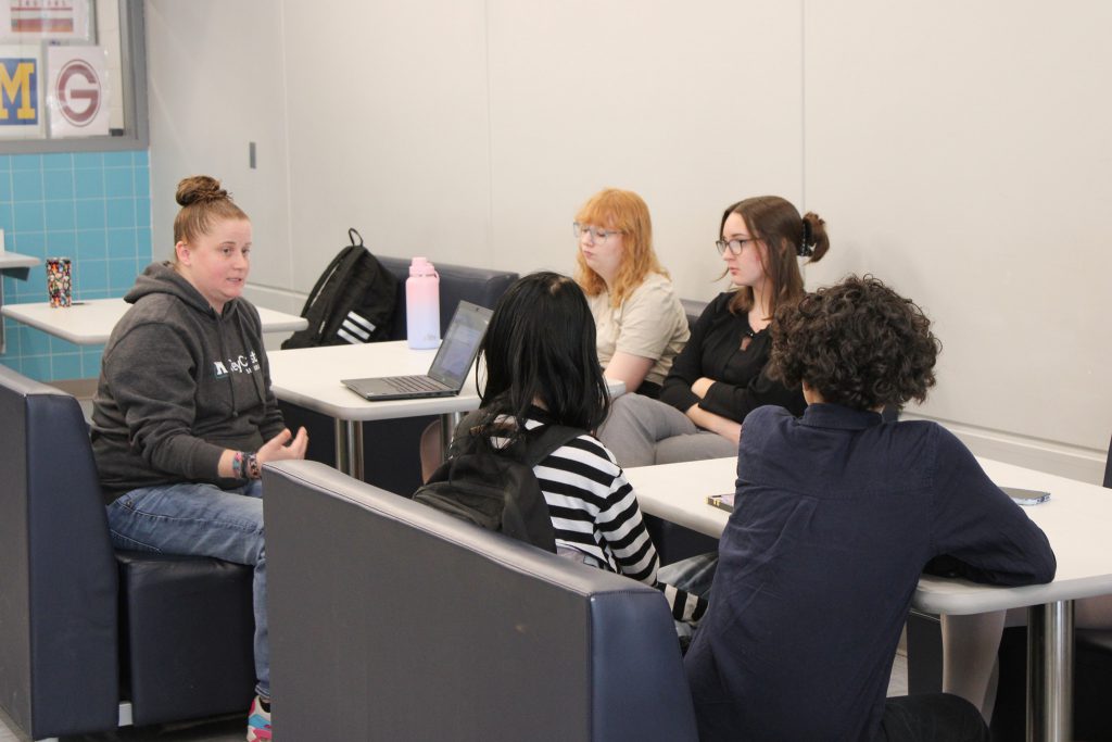 Christina D'Antonio of GreyCastle Security speaks to students about internships during a Workplace Wednesday event.