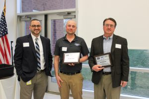 From Left to Right: CTE Principal Mike DiMezza, Seth Brown, and Derek Brown. The Browns are holding plaques that were given to them in recognition for Brown's Fords support of the students at the Career & Technical Education Center