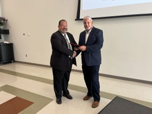 Mike Jacob (left) receives the 2023 HFM Service Award from HFM BOCES District Superintendent Dr. David Ziskin.
