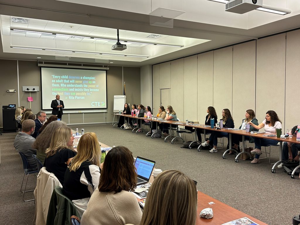 HFM CTE Principal Mike DiMezza speaks to a group of counselors and administrators in the conference room at the HFM BOCES main campus.