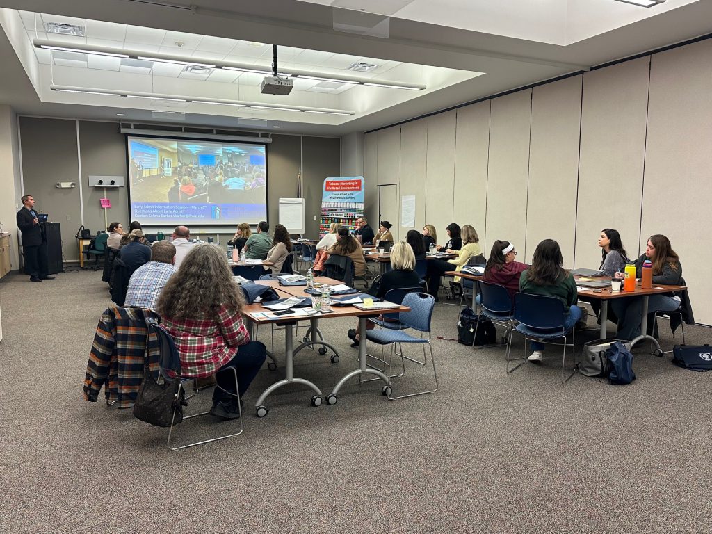 Counselors and Administrators gather in the conference room at the HFM BOCES main campus and listen to John Ramoska from FMCC speak.